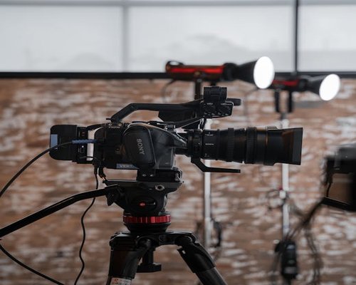 Professional camera and soft lighting setup on a production set